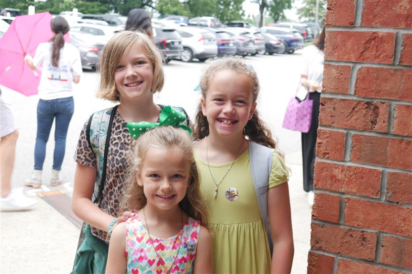 People smile on the first day of school